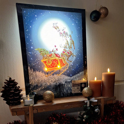 Kerst Canvas schilderij kerstman arreslee met LED