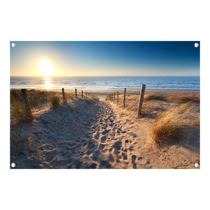Tuinposter duinpad naar zee bij zonsondergang