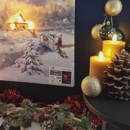 Video led canvas kerst schilderij huisje in de sneeuw